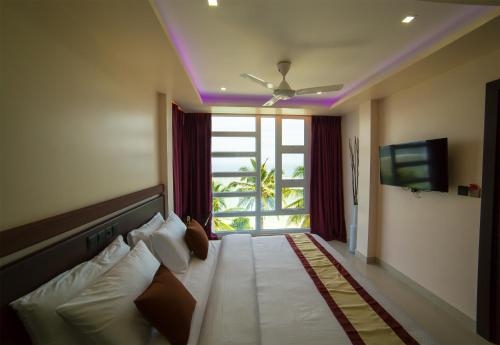 Imagen de la habitación del Hotel The White Harp Beach. Foto 6