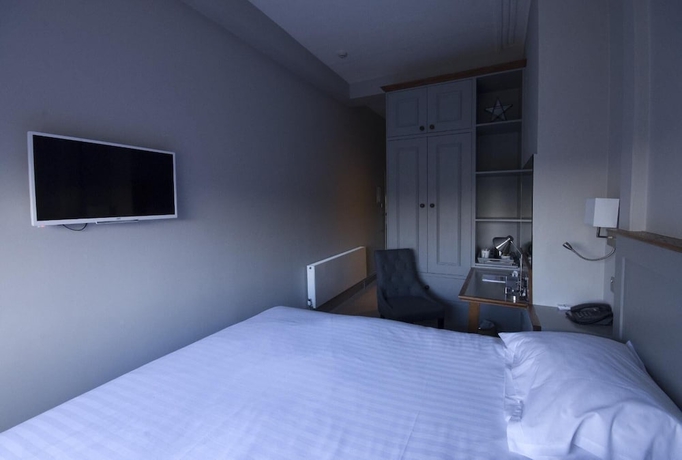 Imagen de la habitación del Hotel The White Hart Inn. Foto 10