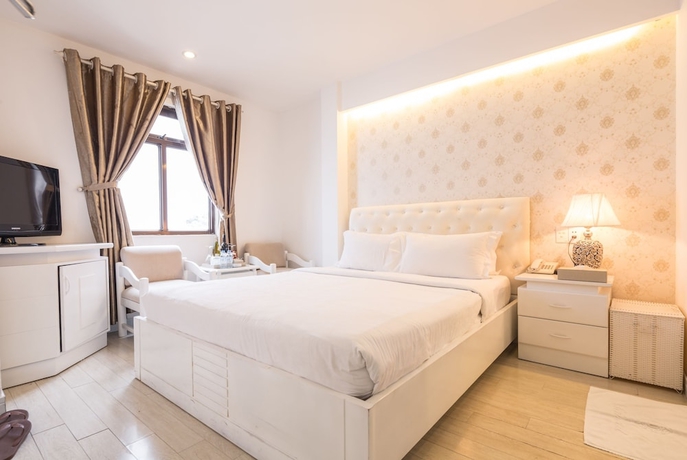 Imagen de la habitación del Hotel The White, Ho Chi Minh. Foto 3