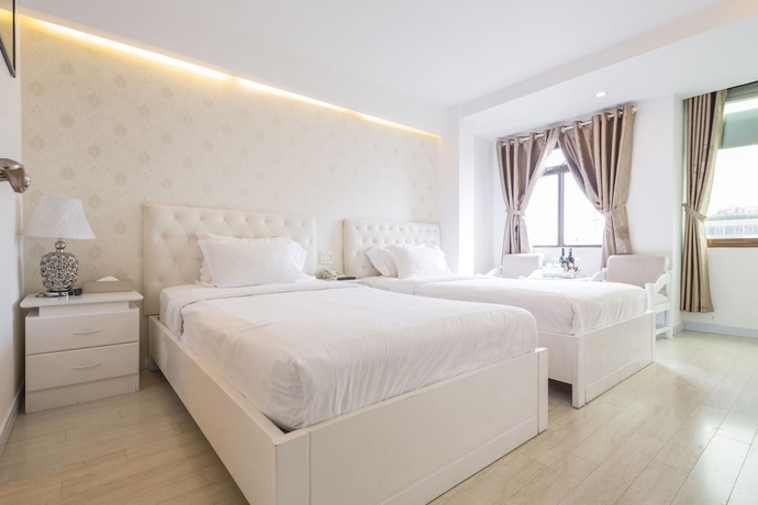 Imagen de la habitación del Hotel The White, Ho Chi Minh. Foto 6