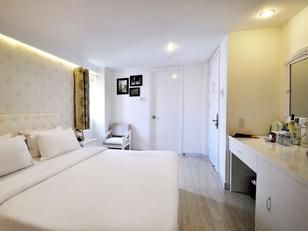 Imagen de la habitación del Hotel The White, Ho Chi Minh. Foto 18