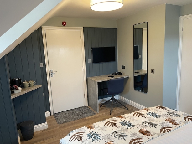 Imagen de la habitación del Hotel The White Horse Inn. Foto 13