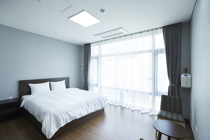 Imagen de la habitación del Hotel The White Hotel. Foto 18