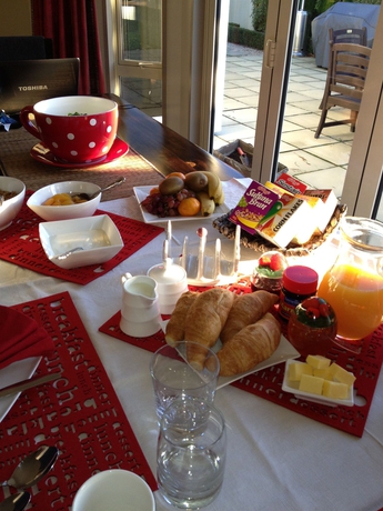 Imagen del bar/restaurante del Hotel The White House Byamp;B. Foto 2