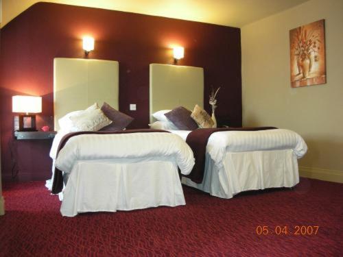 Imagen de la habitación del Hotel The White House. Foto 9