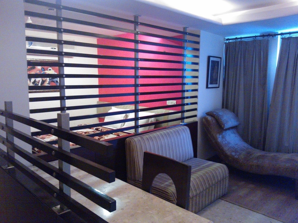 Imagen de la habitación del Hotel The White Klove. Foto 9