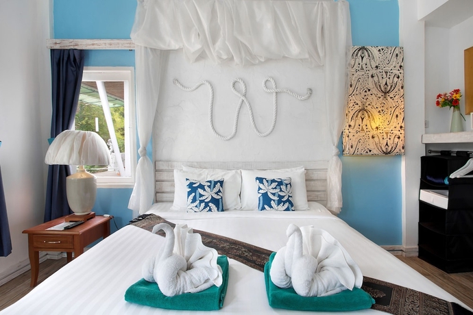 Imagen de la habitación del Hotel The White Knot Koh Chang. Foto 7