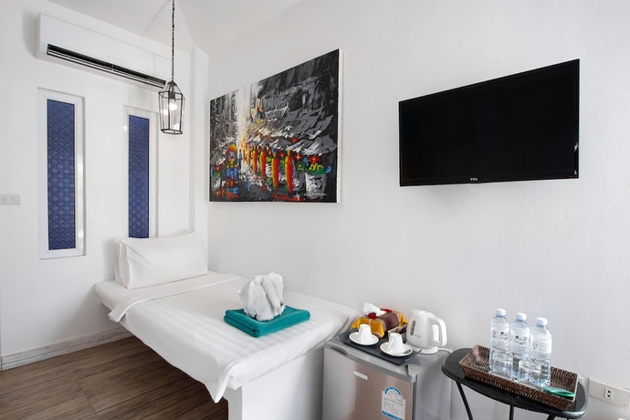 Imagen de la habitación del Hotel The White Knot Koh Chang. Foto 9