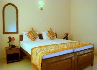 Imagen de la habitación del Hotel The White Orchid Resort. Foto 9