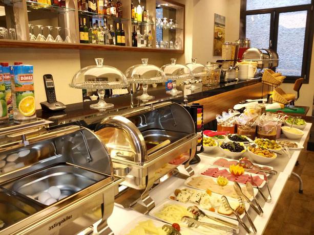 Imagen del bar/restaurante del Hotel The White Orient. Foto 2