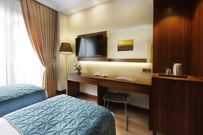 Imagen de la habitación del Hotel The White Orient. Foto 7