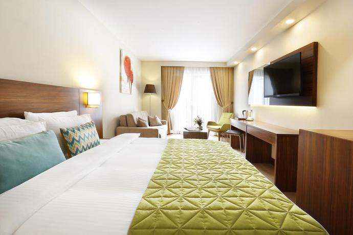 Imagen de la habitación del Hotel The White Orient. Foto 9