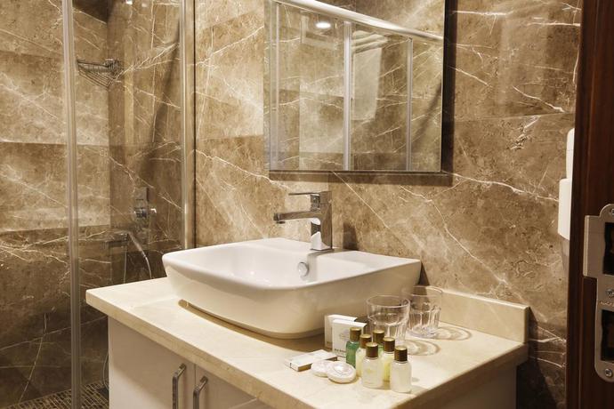 Imagen de la habitación del Hotel The White Orient. Foto 10