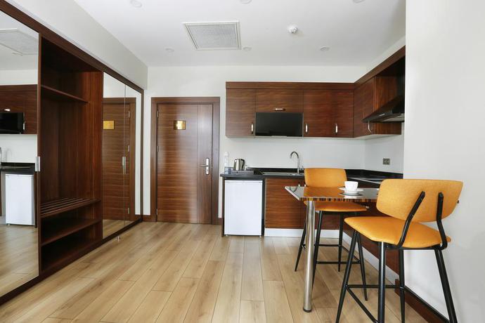 Imagen de la habitación del Hotel The White Orient. Foto 11