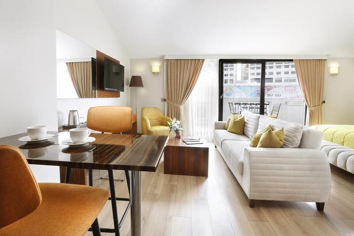 Imagen de la habitación del Hotel The White Orient. Foto 13