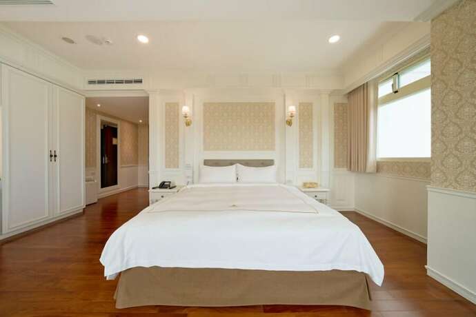 Imagen de la habitación del Hotel The White Paris. Foto 16
