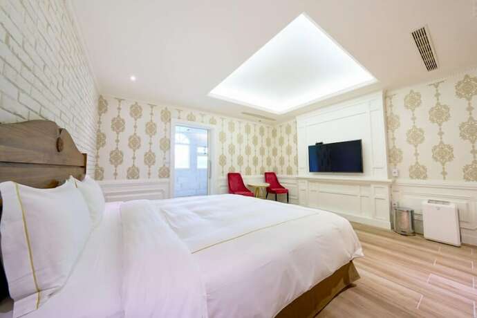 Imagen de la habitación del Hotel The White Paris. Foto 20