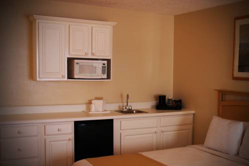 Imagen de la habitación del Hotel The White Sands Oceanfront Resort and Spa. Foto 6
