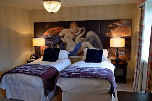 Imagen de la habitación del Hotel The White Swan. Foto 13