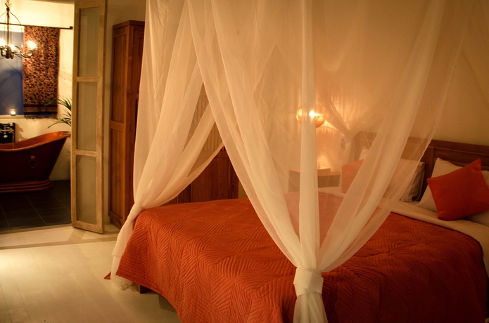 Imagen de la habitación del Hotel The White Villas Ubud. Foto 3