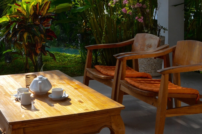 Imagen de los exteriores del Hotel The White Villas Ubud. Foto 12