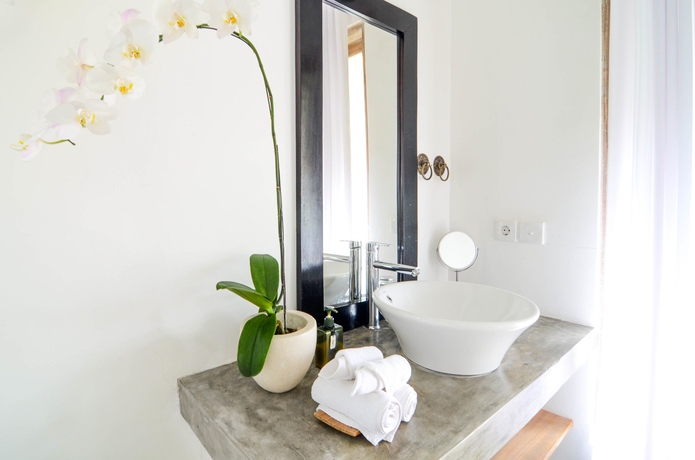 Imagen de la habitación del Hotel The White Villas Ubud. Foto 6