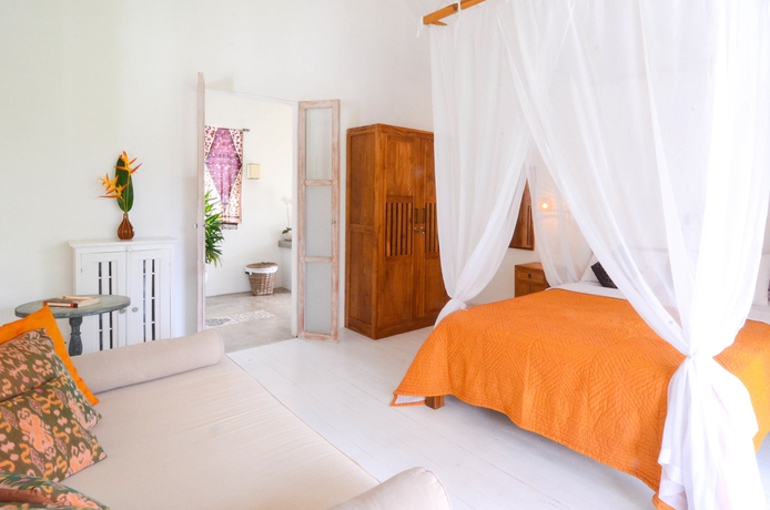 Imagen de la habitación del Hotel The White Villas Ubud. Foto 7