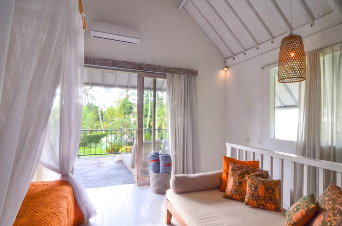 Imagen de la habitación del Hotel The White Villas Ubud. Foto 8