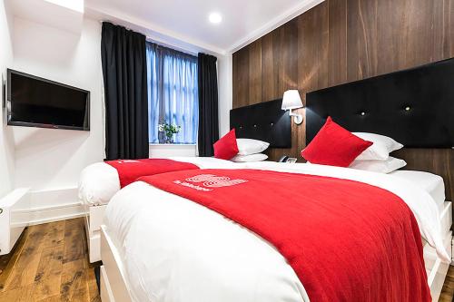 Imagen de la habitación del Hotel The Whitechapel. Foto 4
