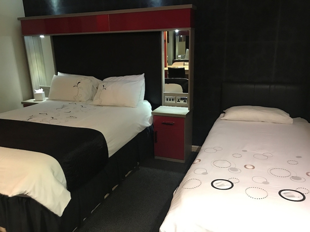 Imagen de la habitación del Hotel The Whitehall and Distillery. Foto 8