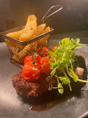 Imagen del bar/restaurante del Hotel The Whitehall and Distillery. Foto 4