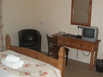 Imagen de los interiores del Hotel The Whitehouse Inn. Foto 14