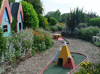 Imagen de la habitación del Hotel The Whitehouse Inn. Foto 7