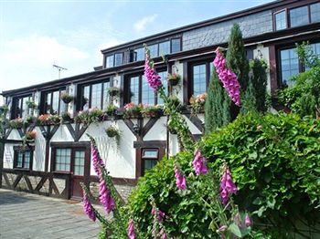 Imagen de la habitación del Hotel The Whitehouse Inn. Foto 8