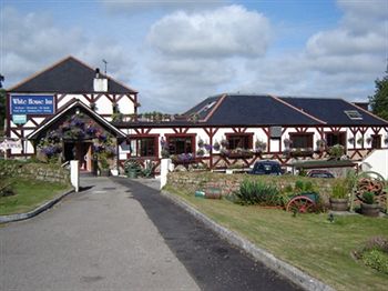 Imagen de la habitación del Hotel The Whitehouse Inn. Foto 9