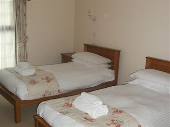 Imagen de los interiores del Hotel The Whitehouse Inn. Foto 16