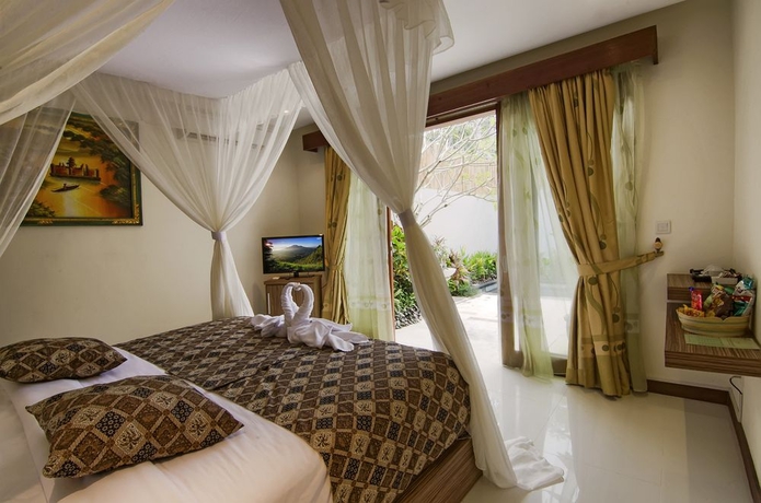 Imagen de la habitación del Hotel The Widyas Bali Villa. Foto 4