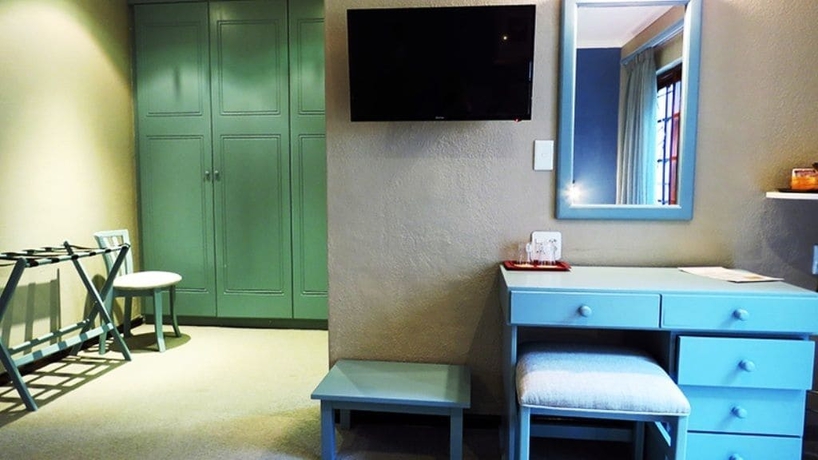 Imagen de la habitación del Hotel The Wilderness. Foto 10