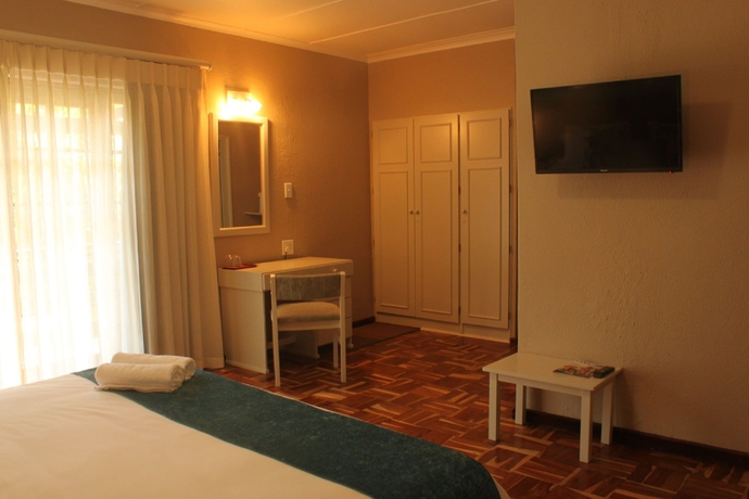 Imagen de la habitación del Hotel The Wilderness. Foto 11