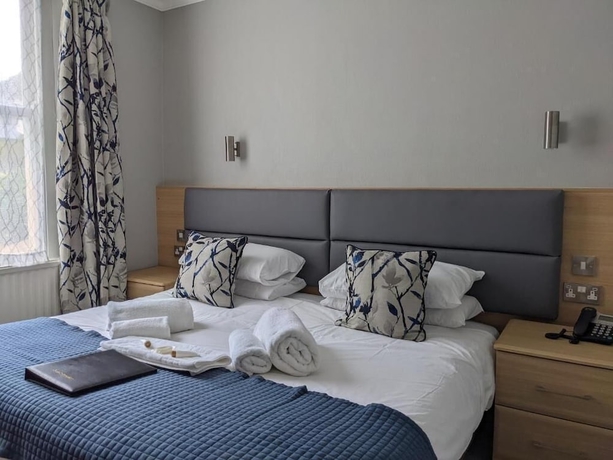 Imagen de la habitación del Hotel The Wildings. Foto 4