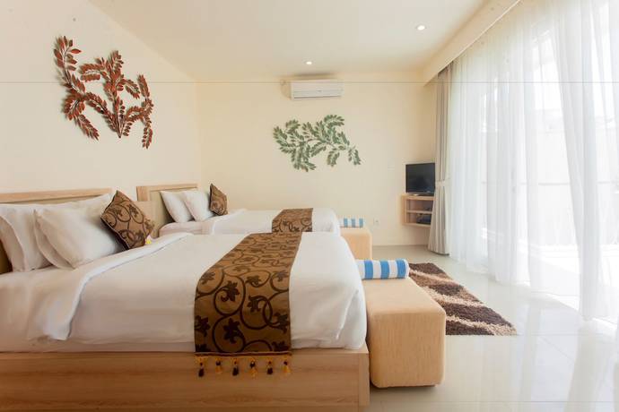 Imagen de la habitación del Hotel The Wina Villa Canggu. Foto 3