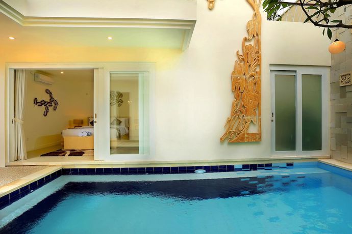 Imagen de la habitación del Hotel The Wina Villa Canggu. Foto 17