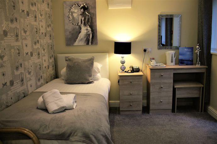 Imagen de la habitación del Hotel The Winchmore. Foto 7