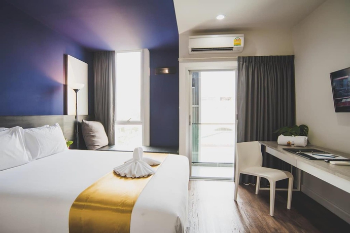 Imagen de la habitación del Hotel The Wind Holiday. Foto 6