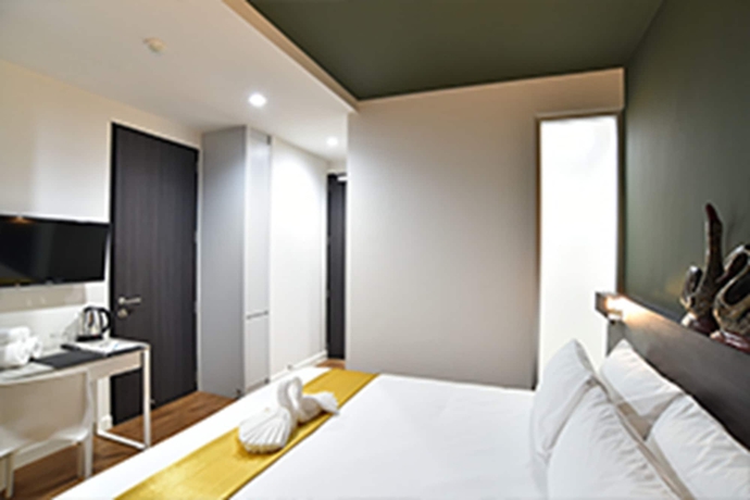 Imagen de la habitación del Hotel The Wind Holiday. Foto 8