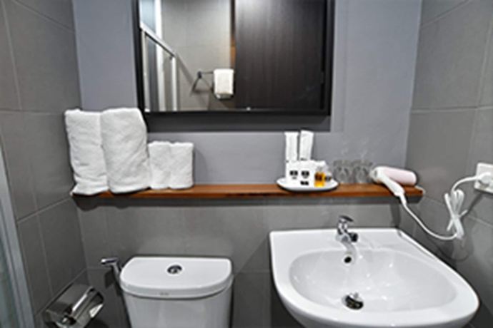 Imagen de la habitación del Hotel The Wind Holiday. Foto 12