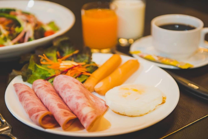 Imagen del bar/restaurante del Hotel The Wind Holiday. Foto 4