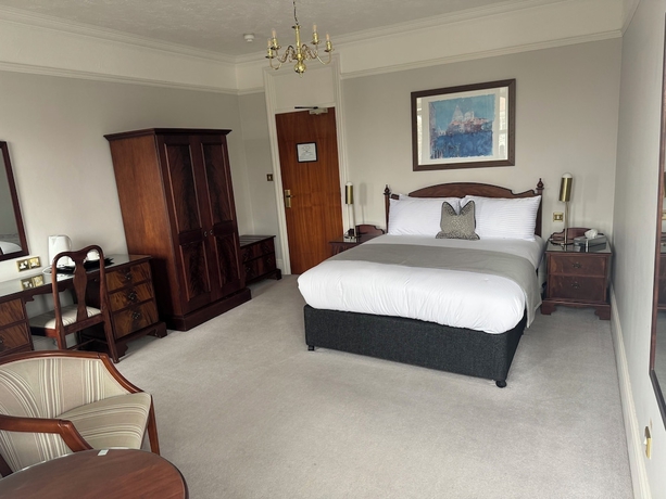 Imagen de la habitación del Hotel The Windsor House. Foto 3