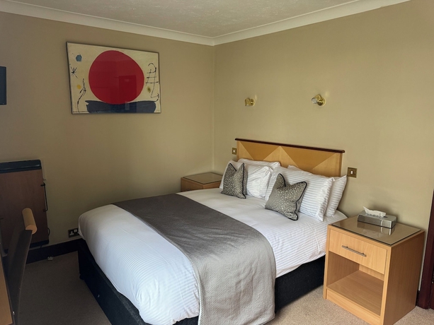 Imagen de la habitación del Hotel The Windsor House. Foto 4