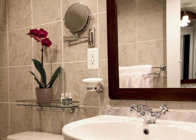 Imagen de la habitación del Hotel The Windsor Suites. Foto 9